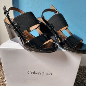 CK women's black patent sandals